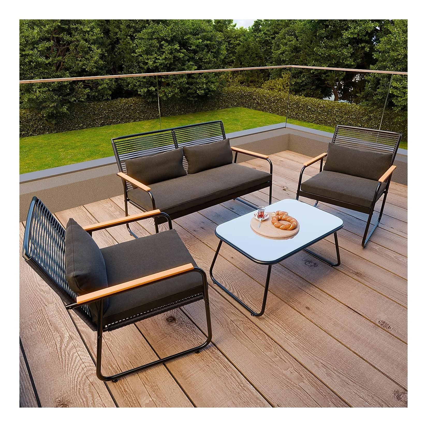 GARMIO Gartenlounge-Set 4-teilig mit Kissen Polyrattan Glastisch