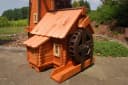 DSH DEKO SHOP HANNUSCH Gartenfigur Windmühle mit Wassermühle Bild 1